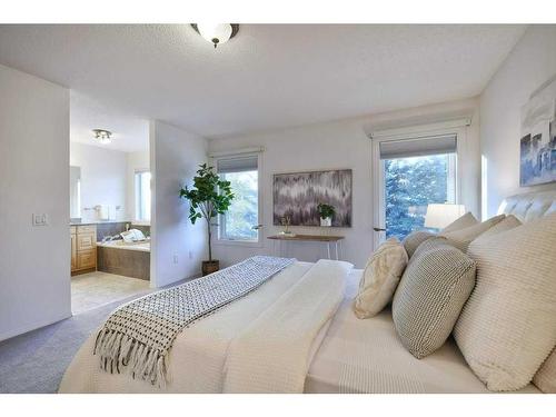 13 Mt Robson Close Se, Calgary, AB - Indoor Photo Showing Bedroom