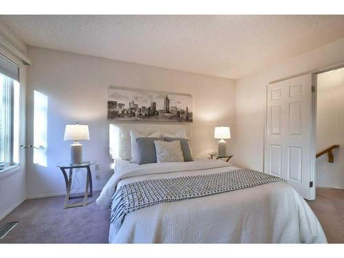 13 Mt Robson Close Se, Calgary, AB - Indoor Photo Showing Bedroom