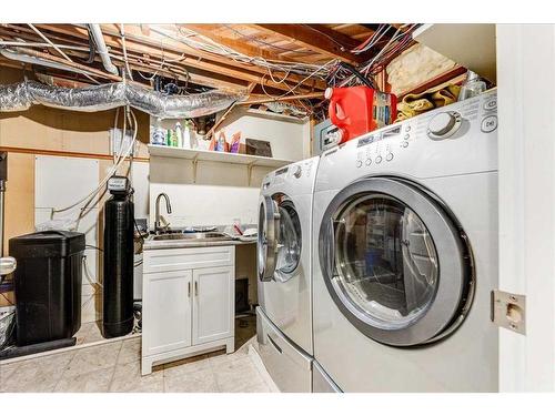 7403 Hunterhaven Place Nw, Calgary, AB - Indoor Photo Showing Laundry Room