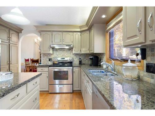 52 Arbour Ridge Way Nw, Calgary, AB - Indoor Photo Showing Kitchen With Double Sink