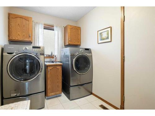 52 Arbour Ridge Way Nw, Calgary, AB - Indoor Photo Showing Laundry Room