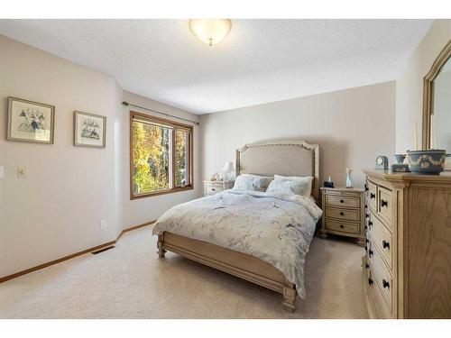 52 Arbour Ridge Way Nw, Calgary, AB - Indoor Photo Showing Bedroom