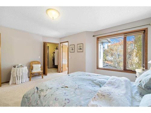 52 Arbour Ridge Way Nw, Calgary, AB - Indoor Photo Showing Bedroom