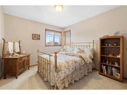 52 Arbour Ridge Way Nw, Calgary, AB - Indoor Photo Showing Bedroom