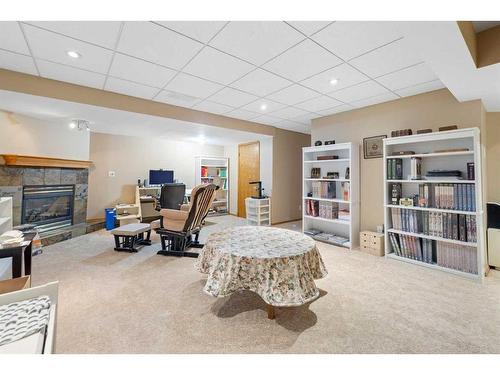 52 Arbour Ridge Way Nw, Calgary, AB - Indoor With Fireplace