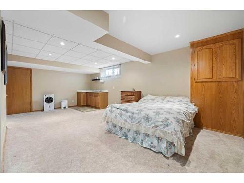 52 Arbour Ridge Way Nw, Calgary, AB - Indoor Photo Showing Bedroom