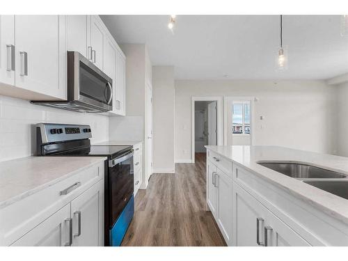 408-35 Walgrove Se, Calgary, AB - Indoor Photo Showing Kitchen With Upgraded Kitchen