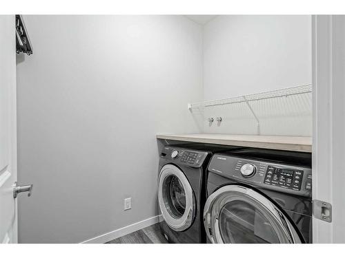 217 Lucas Crescent Nw, Calgary, AB - Indoor Photo Showing Laundry Room