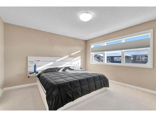 333 Clydesdale Way, Cochrane, AB - Indoor Photo Showing Bedroom