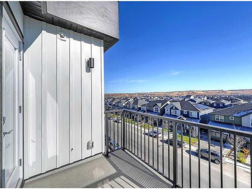 4407-111 Wolf Creek Drive Se, Calgary, AB - Outdoor With Balcony With Exterior