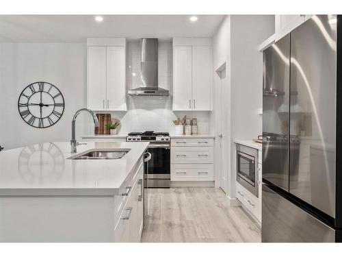 21 Cimarron Estates, Okotoks, AB - Indoor Photo Showing Kitchen With Double Sink With Upgraded Kitchen