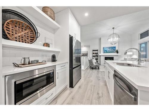 21 Cimarron Estates, Okotoks, AB - Indoor Photo Showing Kitchen With Stainless Steel Kitchen With Upgraded Kitchen