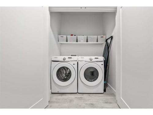 21 Cimarron Estates, Okotoks, AB - Indoor Photo Showing Laundry Room