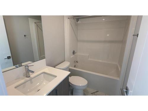 4213-111 Wolf Creek Drive Se, Calgary, AB - Indoor Photo Showing Bathroom