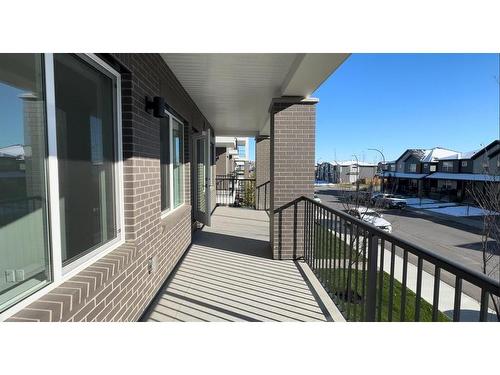 4213-111 Wolf Creek Drive Se, Calgary, AB - Outdoor With Deck Patio Veranda With Exterior