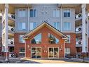 210-8535 Bonaventure Drive Se, Calgary, AB  - Outdoor With Balcony With Facade 