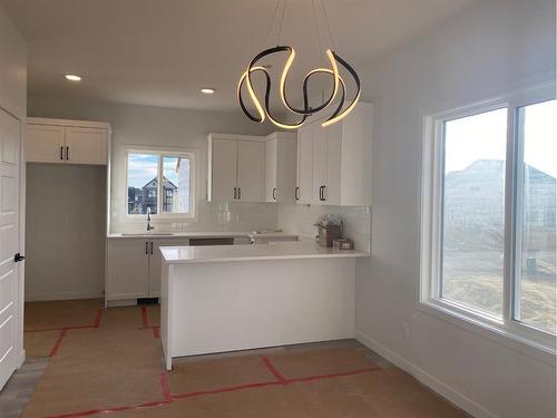 148 Lawson Lane Se, Airdrie, AB - Indoor Photo Showing Kitchen