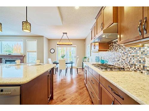 105 Aspen Stone Road Sw, Calgary, AB - Indoor Photo Showing Kitchen With Upgraded Kitchen