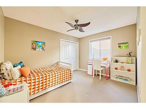 105 Aspen Stone Road Sw, Calgary, AB - Indoor Photo Showing Bedroom