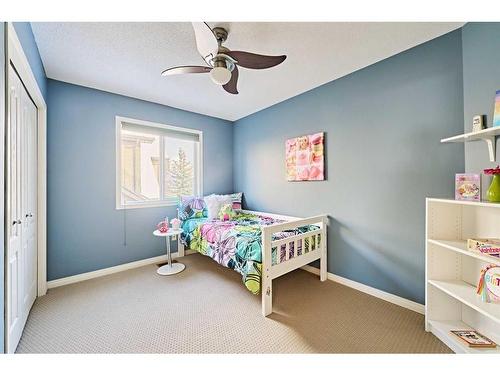 105 Aspen Stone Road Sw, Calgary, AB - Indoor Photo Showing Bedroom