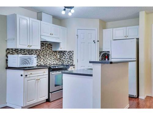 310-290 Shawville Way Se, Calgary, AB - Indoor Photo Showing Kitchen