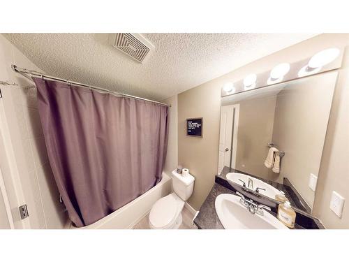 3205-403 Mackenzie Way Sw, Airdrie, AB - Indoor Photo Showing Bathroom