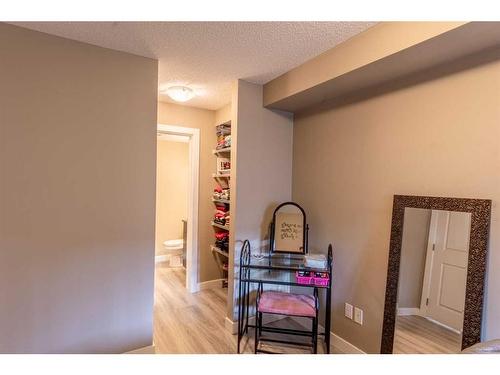 3205-403 Mackenzie Way Sw, Airdrie, AB - Indoor Photo Showing Other Room