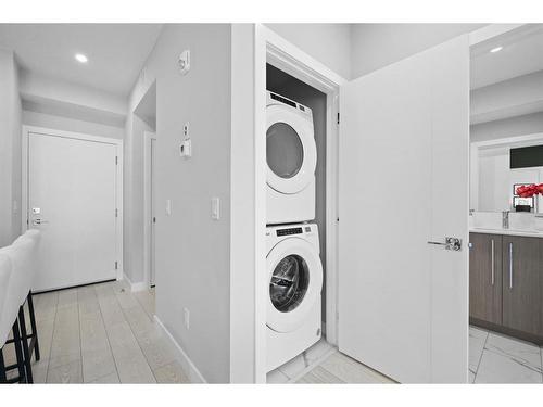 3106-111 Wolf Creek Drive Se, Calgary, AB - Indoor Photo Showing Laundry Room