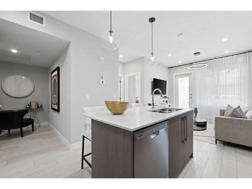 3106-111 Wolf Creek Drive Se, Calgary, AB - Indoor Photo Showing Kitchen With Double Sink With Upgraded Kitchen