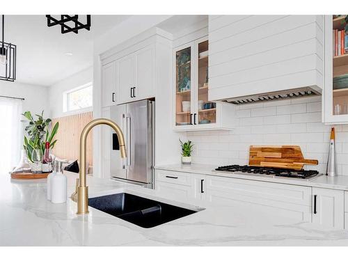 2337 53 Avenue Sw, Calgary, AB - Indoor Photo Showing Kitchen With Double Sink