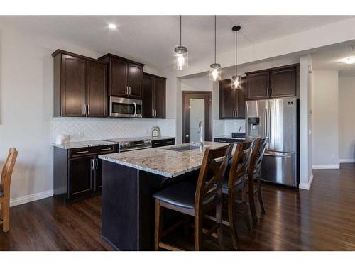 616 Reynolds Crescent Sw, Airdrie, AB - Indoor Photo Showing Kitchen With Upgraded Kitchen