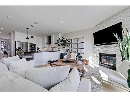 2630 35 Street Sw, Calgary, AB - Indoor Photo Showing Living Room With Fireplace