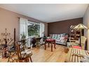 905 Spring Haven Court Se, Airdrie, AB  - Indoor Photo Showing Living Room 