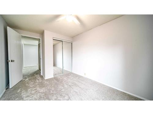 100-630 Sabrina Road Sw, Calgary, AB - Indoor Photo Showing Other Room