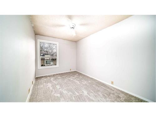 100-630 Sabrina Road Sw, Calgary, AB - Indoor Photo Showing Other Room