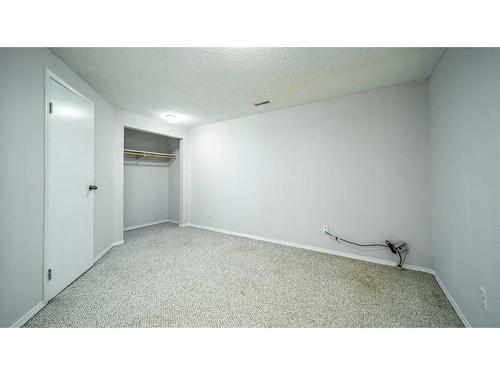 100-630 Sabrina Road Sw, Calgary, AB - Indoor Photo Showing Other Room