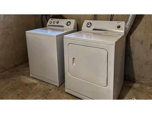 100-630 Sabrina Road Sw, Calgary, AB - Indoor Photo Showing Laundry Room