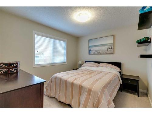 26 Mount Rae Terrace, Okotoks, AB - Indoor Photo Showing Bedroom