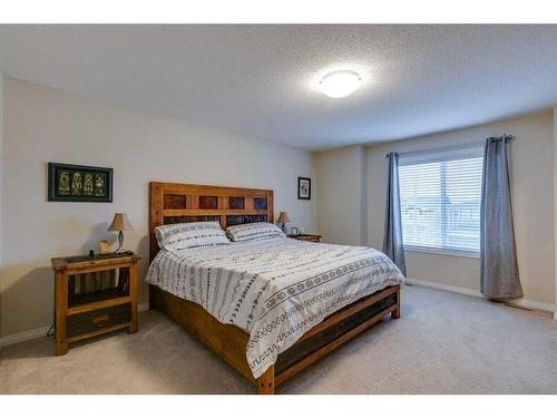 26 Mount Rae Terrace, Okotoks, AB - Indoor Photo Showing Bedroom