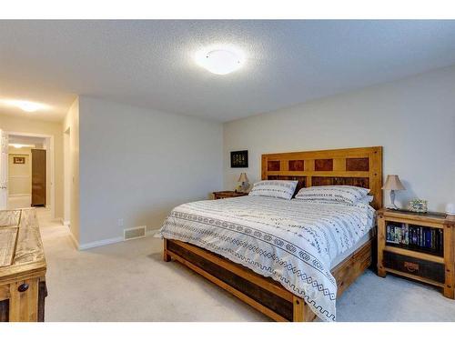 26 Mount Rae Terrace, Okotoks, AB - Indoor Photo Showing Bedroom