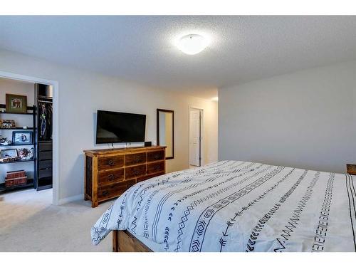 26 Mount Rae Terrace, Okotoks, AB - Indoor Photo Showing Bedroom