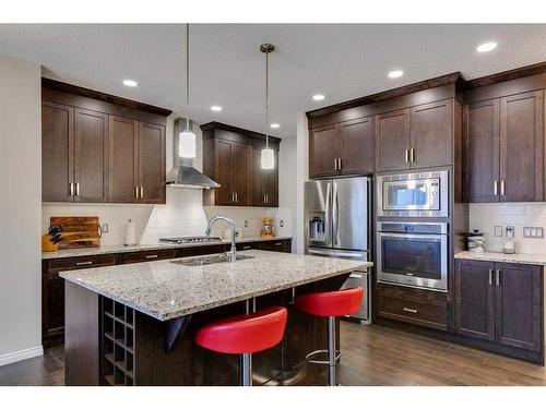 26 Mount Rae Terrace, Okotoks, AB - Indoor Photo Showing Kitchen With Stainless Steel Kitchen