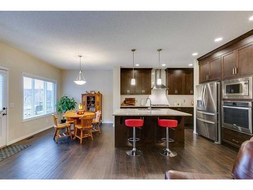 26 Mount Rae Terrace, Okotoks, AB - Indoor Photo Showing Kitchen With Stainless Steel Kitchen