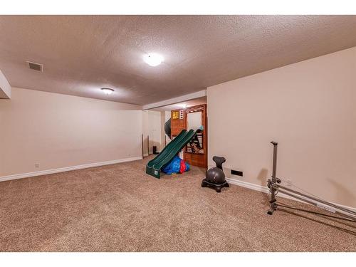 14 Aspen Acres Link Sw, Calgary, AB - Indoor Photo Showing Gym Room