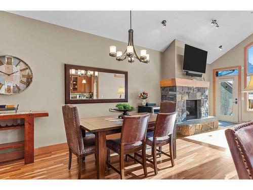 711 3Rd Street, Canmore, AB - Indoor Photo Showing Dining Room With Fireplace