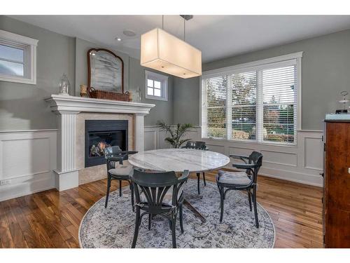 2824 12 Avenue Nw, Calgary, AB - Indoor Photo Showing Dining Room With Fireplace