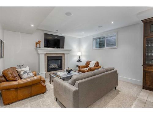 2824 12 Avenue Nw, Calgary, AB - Indoor Photo Showing Living Room With Fireplace