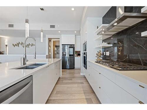 101-17 Mahogany Circle Se, Calgary, AB - Indoor Photo Showing Kitchen With Stainless Steel Kitchen With Double Sink With Upgraded Kitchen