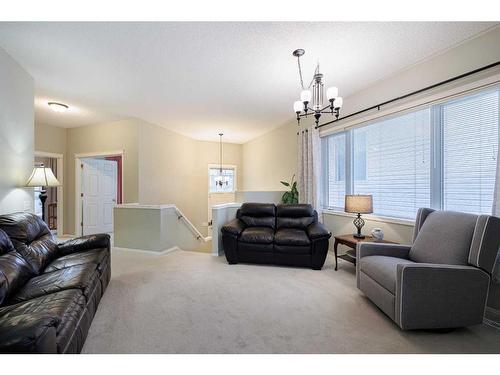 113 Tuscany Way Nw, Calgary, AB - Indoor Photo Showing Living Room