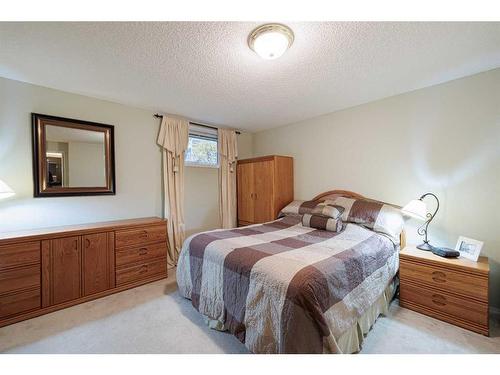 113 Tuscany Way Nw, Calgary, AB - Indoor Photo Showing Bedroom